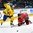 GRAND FORKS, NORTH DAKOTA - APRIL 23: Sweden's Erik Brannstrom #14 and Canada's Jordan Kyrou #25 battle for the puck during semifinal round action at the 2016 IIHF Ice Hockey U18 World Championship. (Photo by Matt Zambonin/HHOF-IIHF Images)


